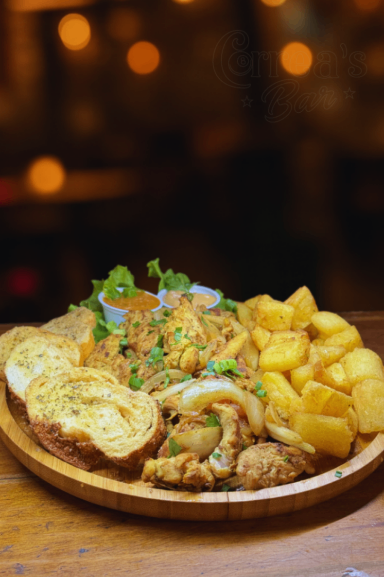 Filé de frango acebolado c/ mandioca