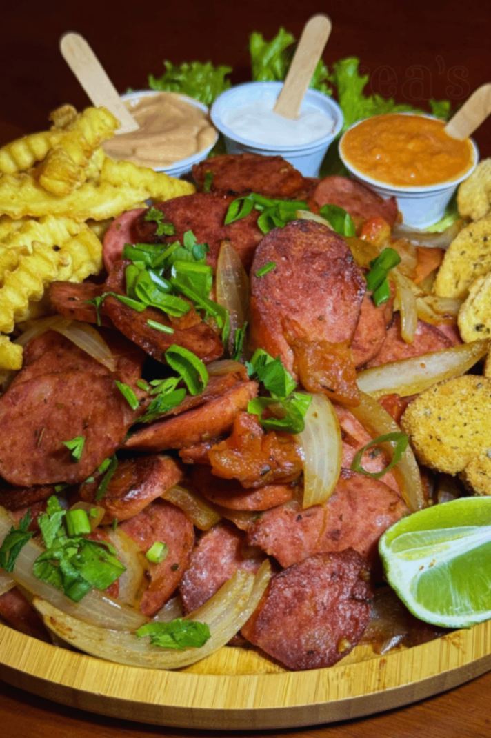 Calabresa acebolada c/ fritas